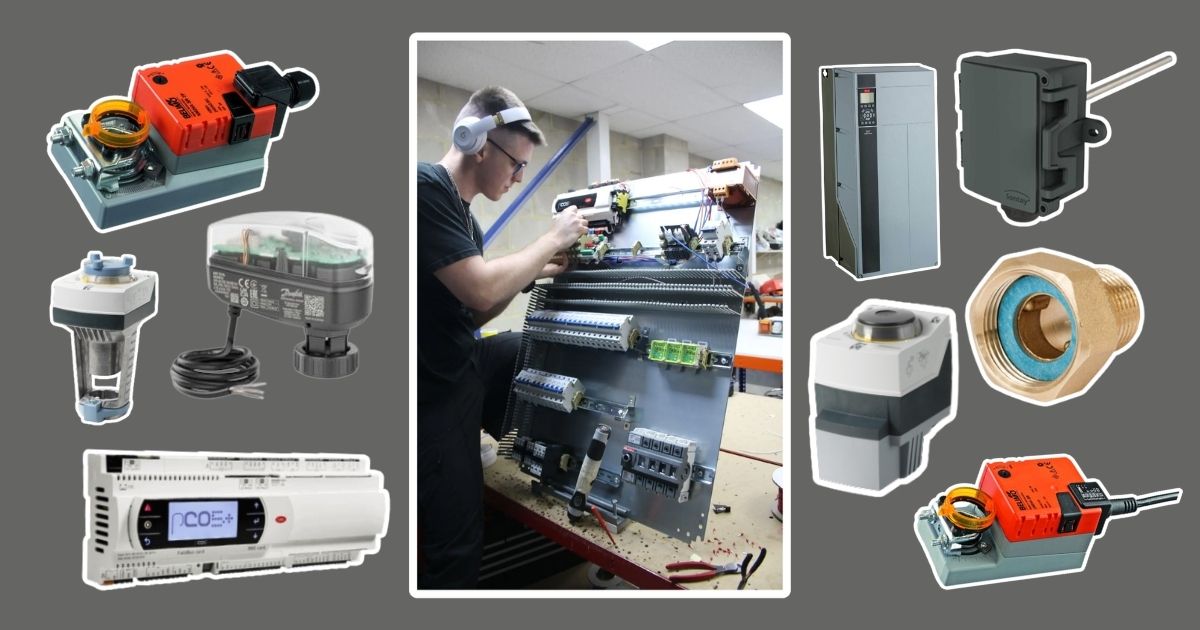 HVAC controls image showing an engineer wiring an electrical control panel surrounded by actuators, sensors, valves, relays and a variable frequency drive for an iACS installation.